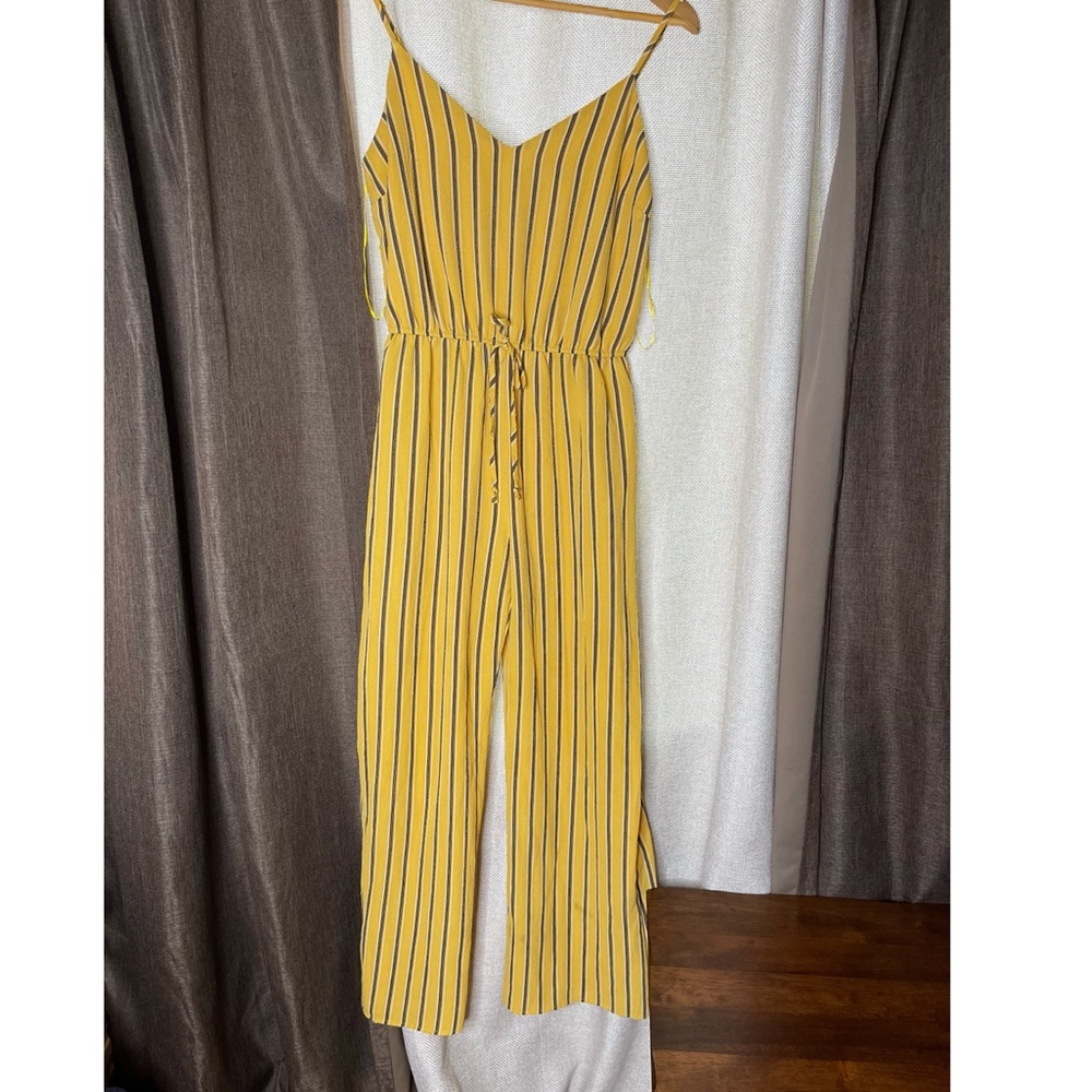 Woman’s Romper  color Mustard in size Medium